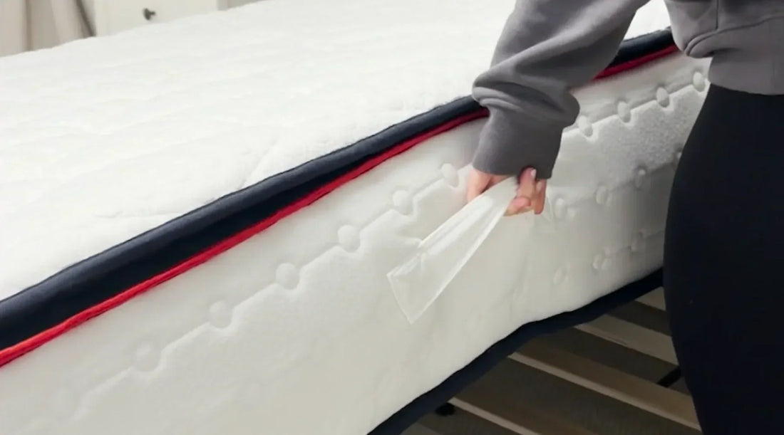 eze_hybrid_mattress_can_you_flip_a_hybrid_mattress_women_holding_handles_to_show_mattress_rotation