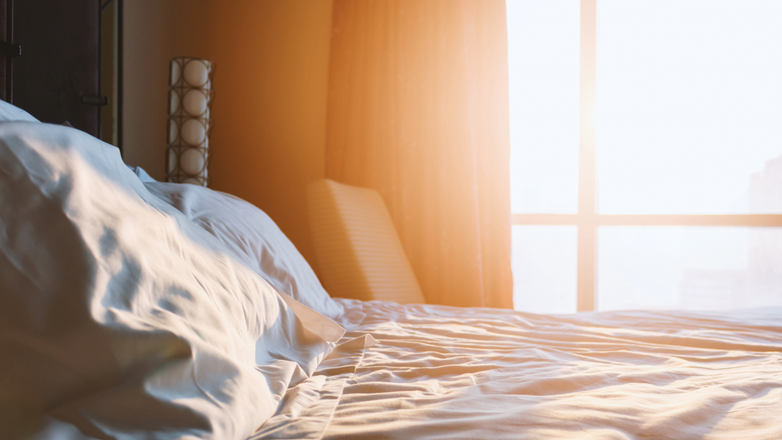 bedroom with light coming through the window in the morning