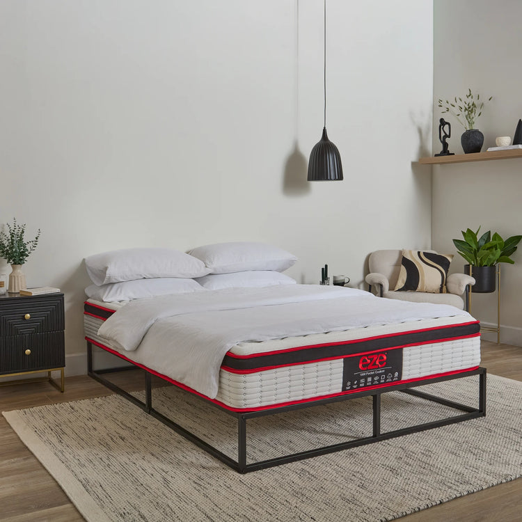 Bed with cooleze hybrid platinum mattress in a bedroom setting