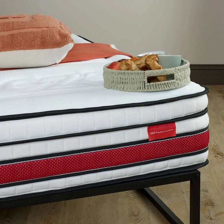 EZE_DELUXEHYBRID_MATTRESS_LIFESTYLE_CORNER_OF_MATTRESS_WITH_GREEN_BREAKFAST_TRAY
