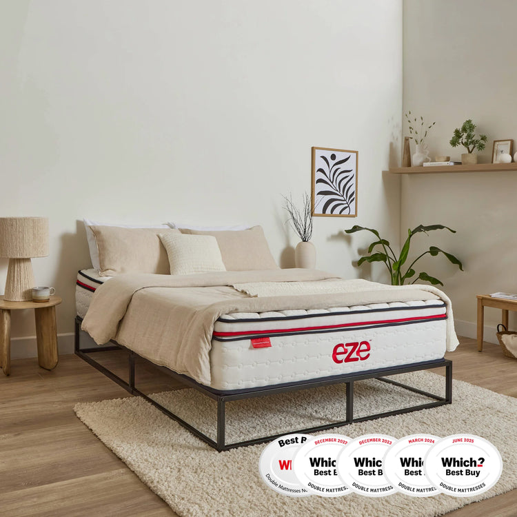 Bed with eze mattress in a bedroom setting, featuring multiple 'Which?' awards.