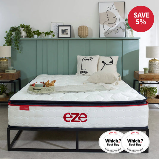 Eze mattress on a bed with decorative pillows and a 'Save 5%' badge in a bedroom setting.