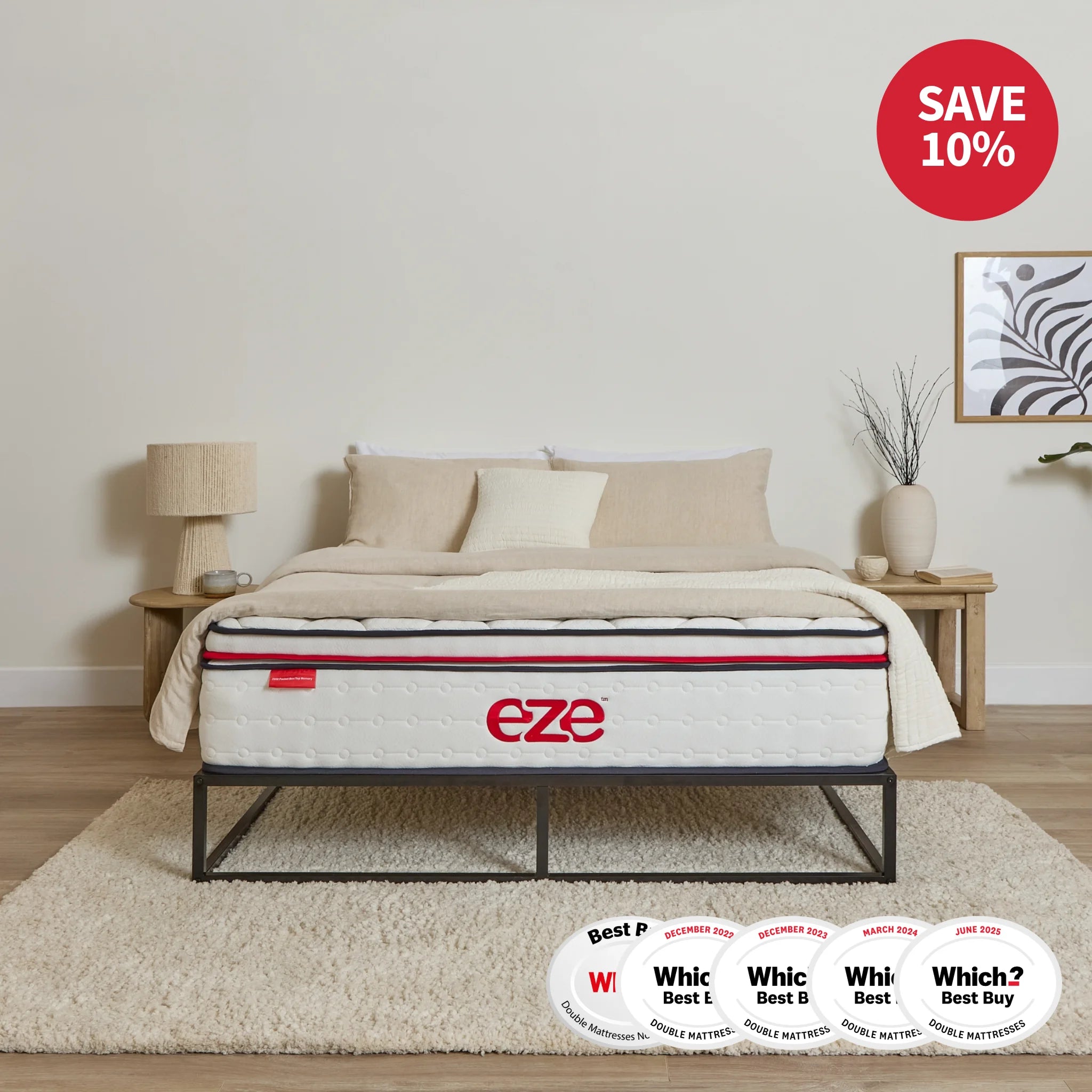 Mattress with 'eze' branding in a bedroom setting, featuring awards below it.