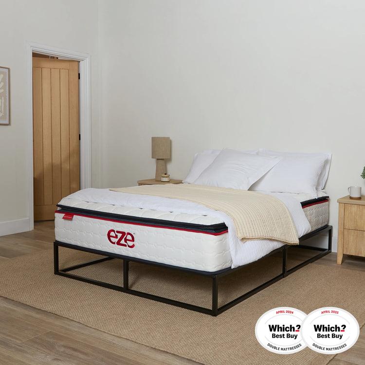 Mattress on a bed with 'eze' branding and 'Which?' Best Buy certification in a bedroom setting.