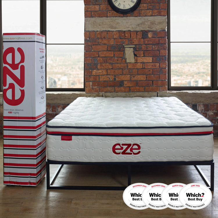 eze™ Hybrid Max Mattress on black metal bed frame in loft-style bedroom with brick walls. Awarded Which? Best Buy 2023 for double mattresses.