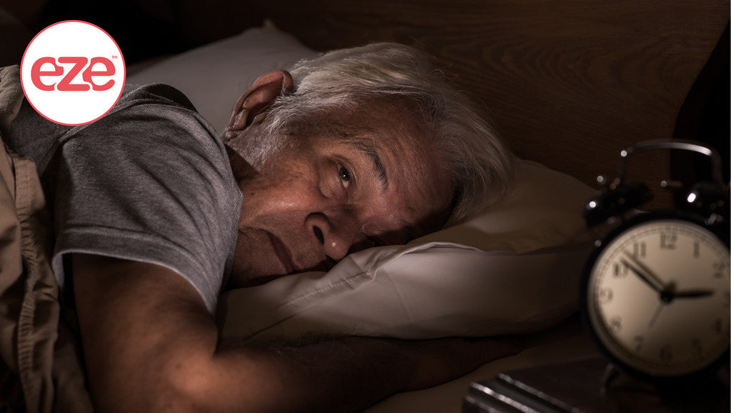 old_man_in_bed_sleeping