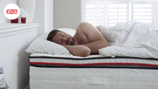 eze_hybrid_2000_mattress_man_sleeping_in_bed