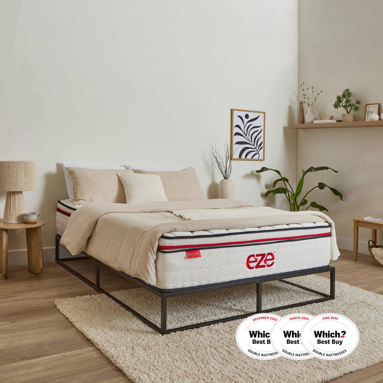 Bed with 'eze' mattress in a bedroom setting, featuring 'Which?' Best Buy logos.