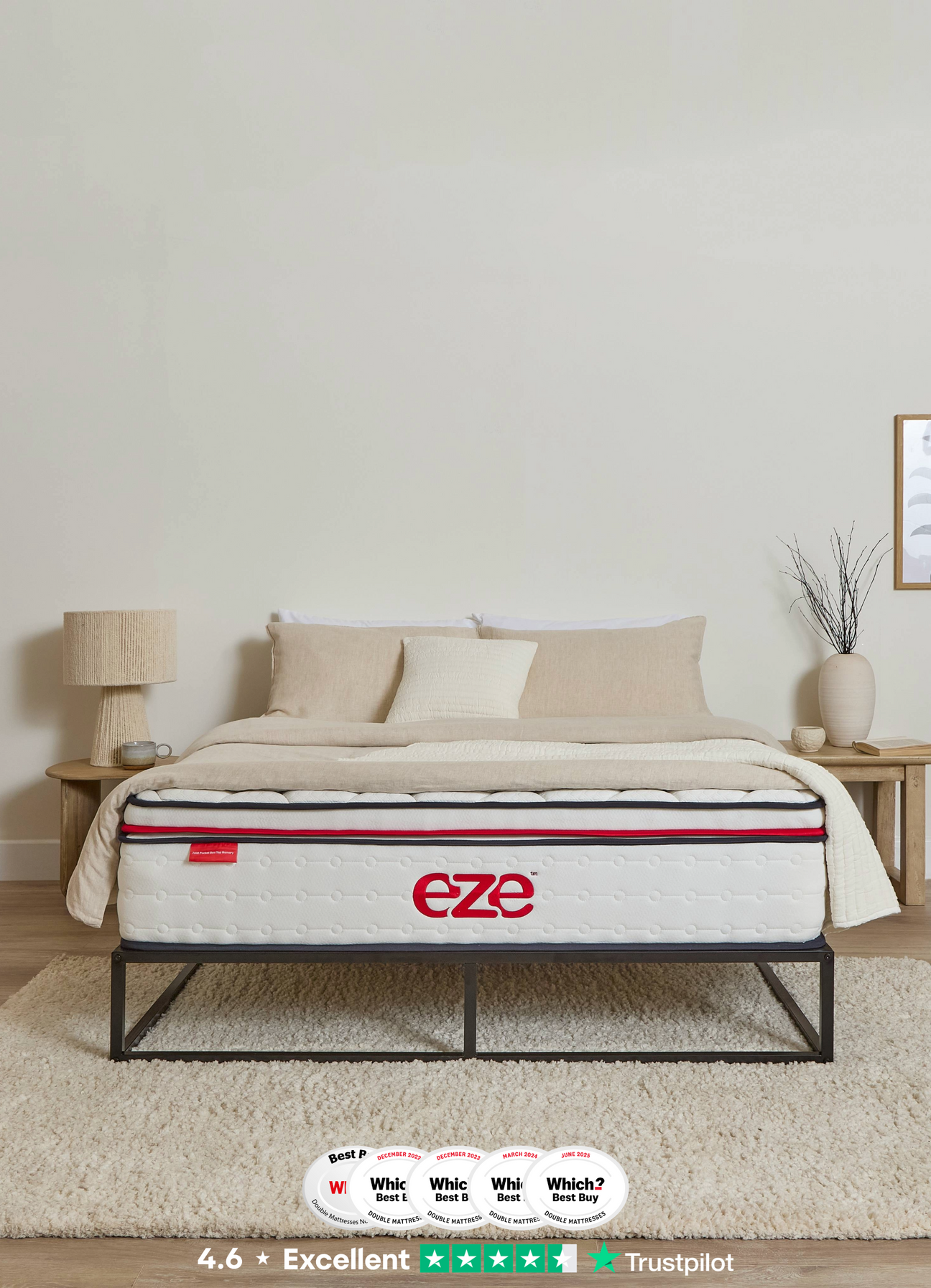 EZE HYBRID MAX MATTRESS IN A NEUTRAL STYLED ROOM ON A BLACK BED FRAME WITH 5 WHICH LOGOS AND RATED 4.6 ON TRUSTPILOT