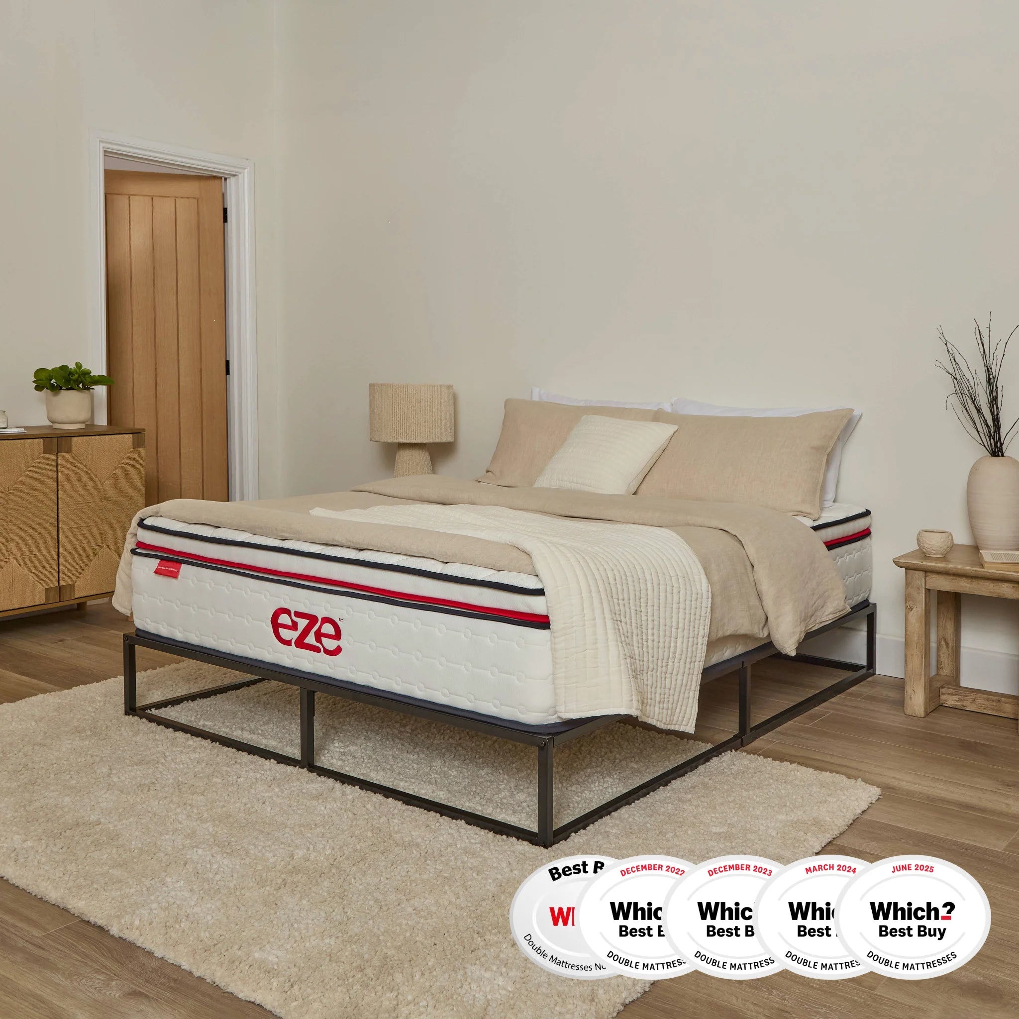 Beige bed with 'eze' branding in a bedroom setting
