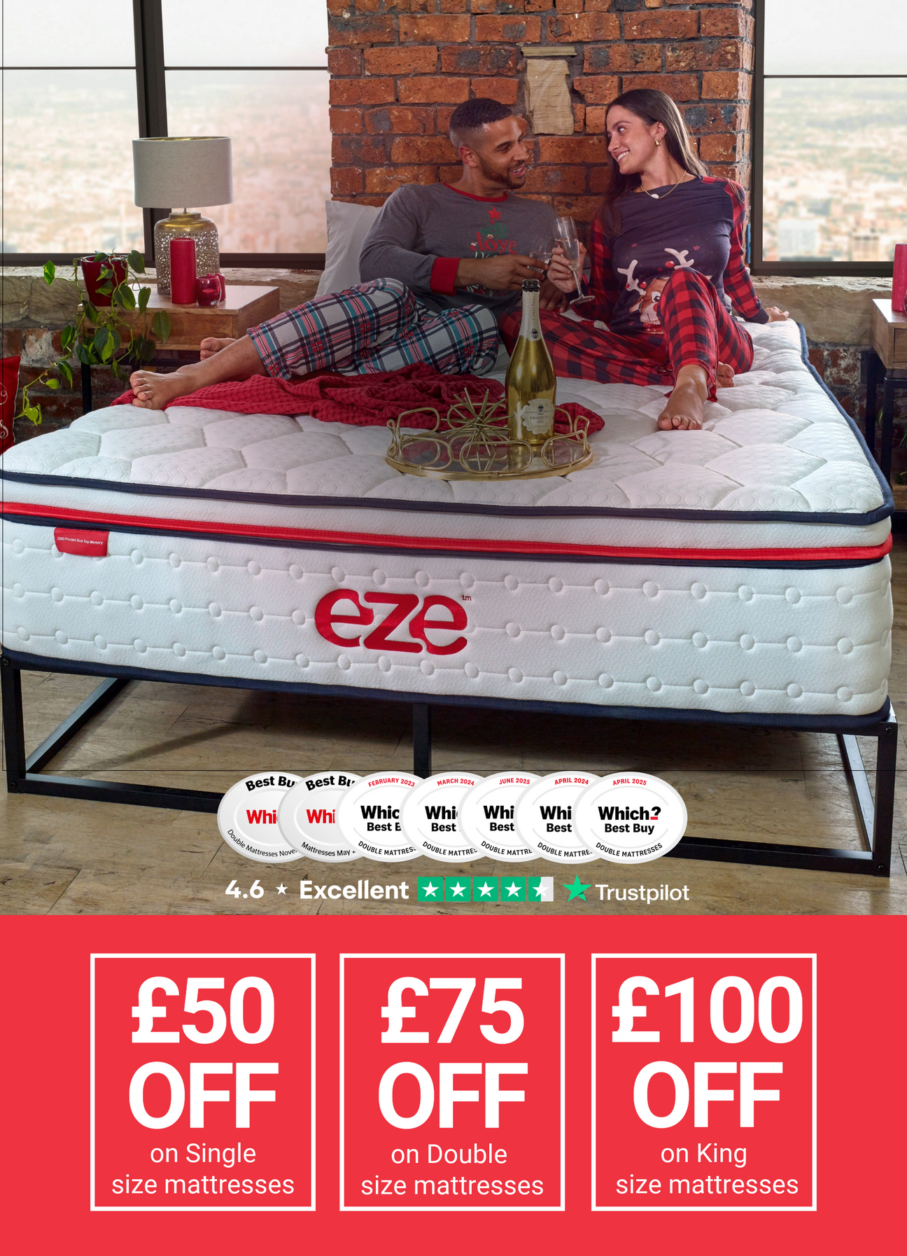 couple on bed drinking champagne on an eze mattress in christmas pjamas