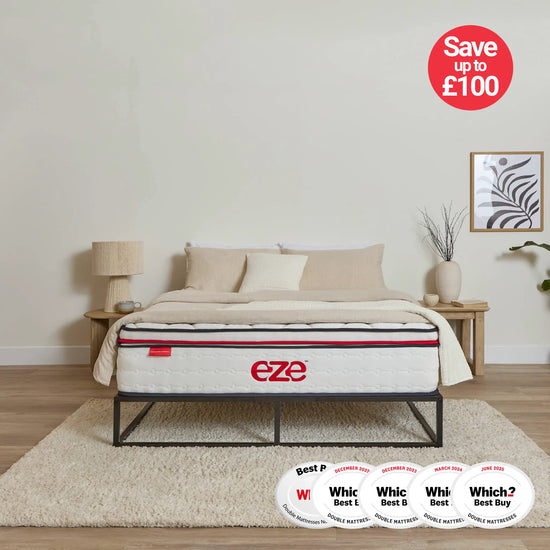 Eze mattress on a bed in a bedroom with 'Save up to £100' and award badges displayed.
