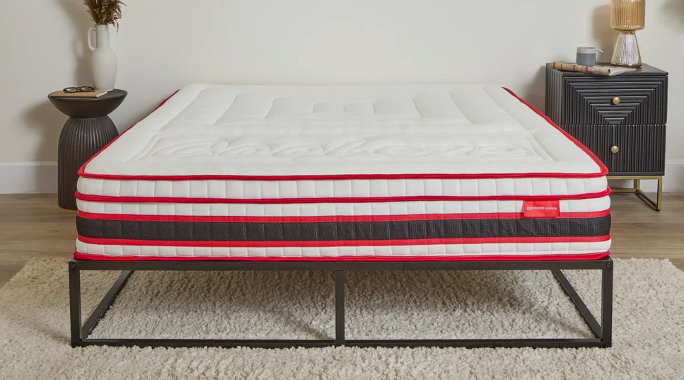 cooleze_hybrid_original_mattress_in_a_styled_room_with_black_furniture