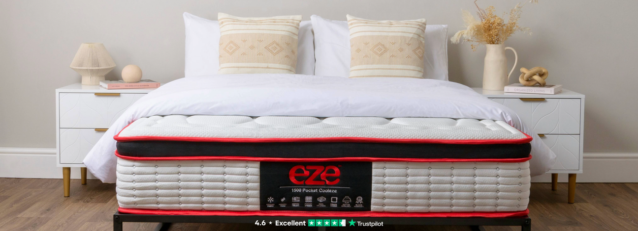 cooleze hybrid platinum mattress on black bed frame with bedside tables and trustpilot rated excellent overlay