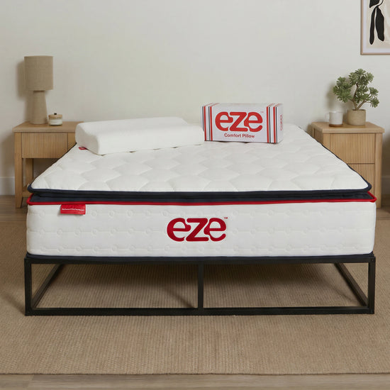 Eze mattress with eze comfort pillow on a bed in a neutral room setting