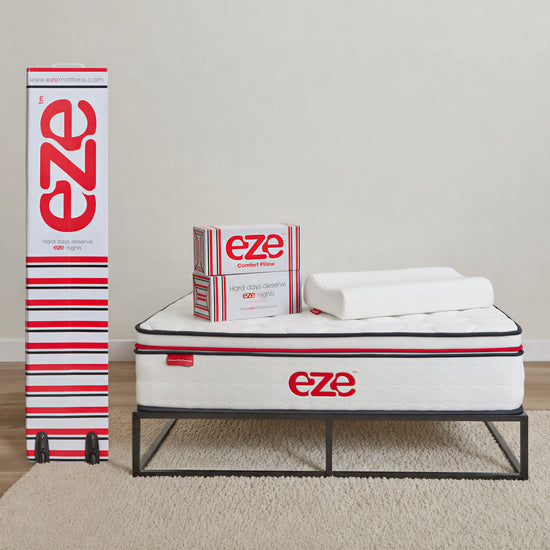 Eze mattress and pillow packaging on a neutral background