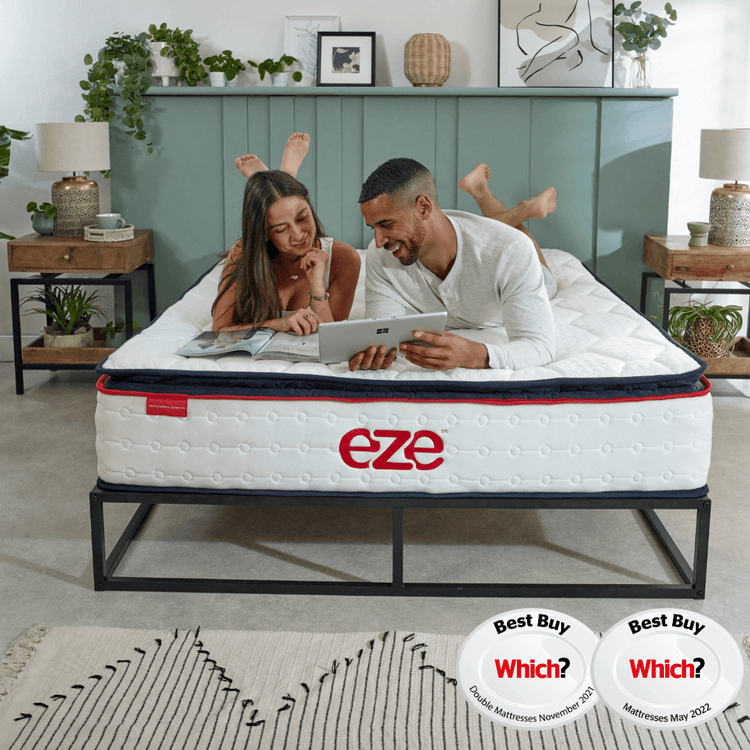 eze_hybrid_ultra_mattress_couple_in_bed_which_logo
